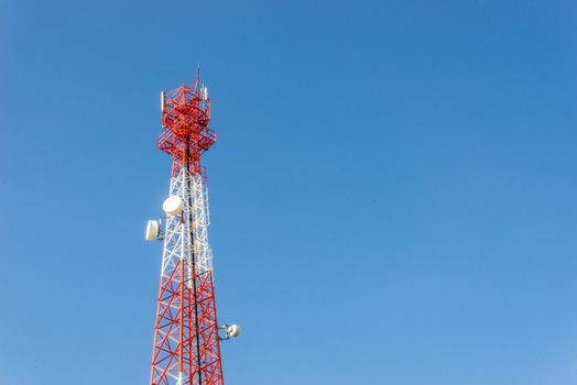 Communications antenna on blue sky