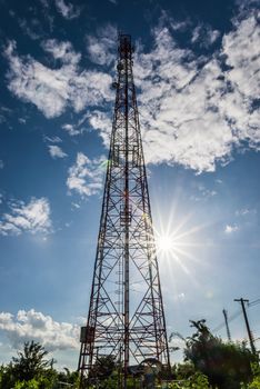 Silhouette in a Antenna transmission. tower at sun wiht fair beautiful.