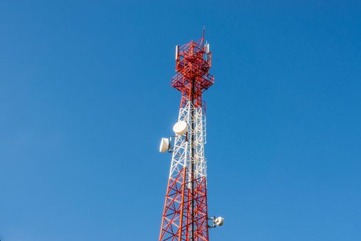 Communications antenna on blue sky