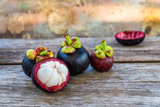 Mangosteen on wooden.