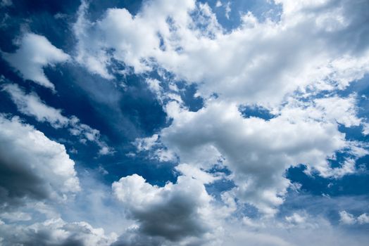 Beautiful dramatic sky with sun rays on a summer day