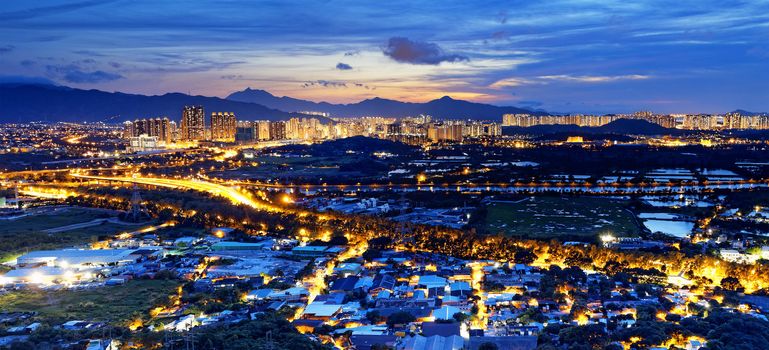 Famed skyline of Hong Kong  Yuen Long downtown sunset