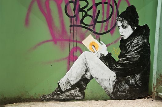 urban art  street in Paris- woman with book