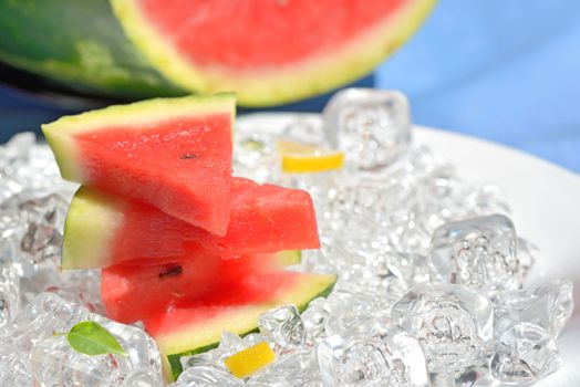 slices of red watermelon and ice cubes