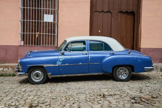 Old american vintage car park on street in Havana Cuba