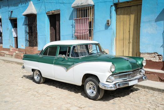 Old american vintage car park on street in Havana Cuba