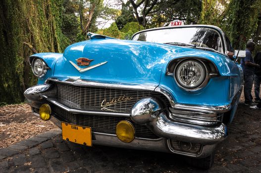 Old american vintage car park on street in Havana Cuba