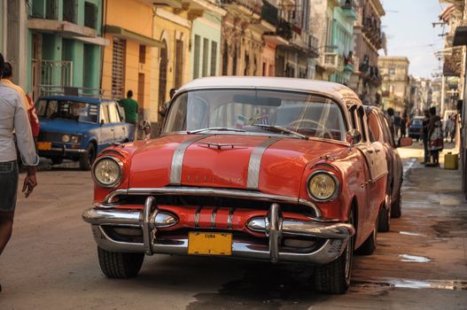 Old american vintage car park on street in Havana Cuba