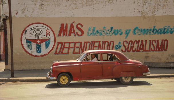 Old american vintage car park on street in Havana Cuba