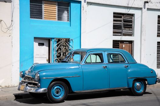 Old american vintage car park on street in Havana Cuba