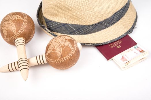 Cuban cigars and hat with passport and cuban currency pesos  on white isolated background







Cuban cigars and hat   on white isolated background