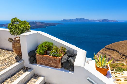 Beautiful View To The Mediterranean Sea Over The White Walls of Fira In Santorini, Greece