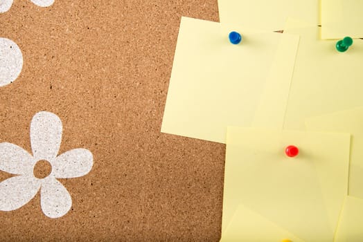 Color sticky memo note cards on cork board