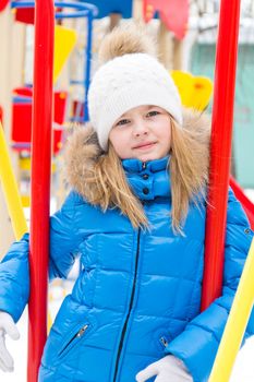 Photo of cute girl with blue eyes in white hat