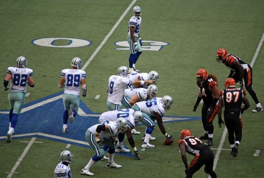 DALLAS - OCT 5: Taken in Texas Staduim, Irving, Texas on October 5, 2008. Dallas quarterback Tony Romo points at the Cininnati Bengals defensive line. The last year Dallas will play in Texas Stadium.
