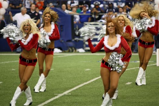 DALLAS - DEC 14: Taken in Texas Stadium on Sunday, December 14, 2008. Dallas Cowboys cheerleaders during a Christmas halftime show. Cowboys played the NY Giants.
