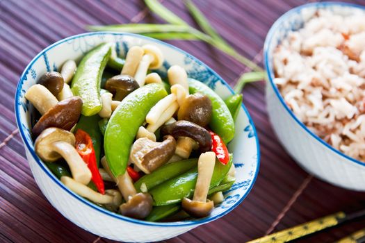 Stirred friedsnap  pea with mushroom in oyster sauce by brown rice