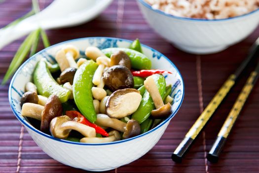 Stirred friedsnap  pea with mushroom in oyster sauce by brown rice