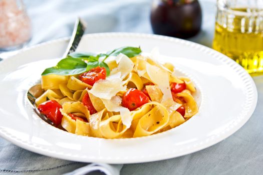 Tagliatelle with cherry tomato and Parmesan on top