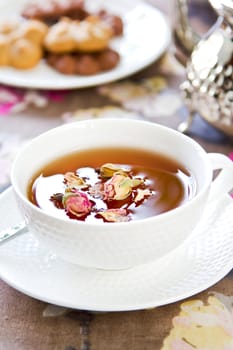 Black Tea with Rose buds by some cookeis