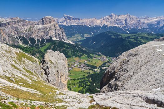 aerial view of Badia Valley with Colfosco village from Sella mount, south tyrol, Italy