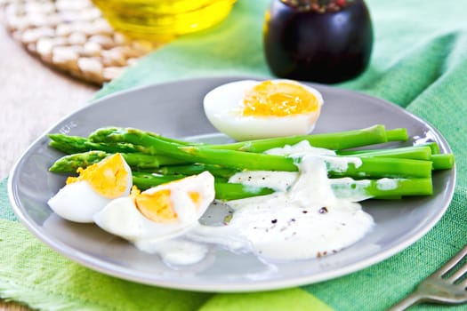 Steamed Asparagus with boiled eggs and sour cream dressing