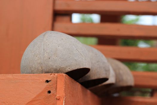 There are the folk wisdom of northern Thailand(Lanna).To make a cup from coconut shell for drinking.