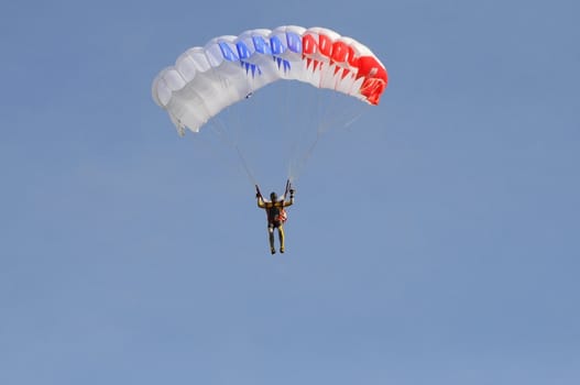 Air show "On a visit at Utair". Tyumen, Russia. 16.08.2014. The parachutist with a parachute