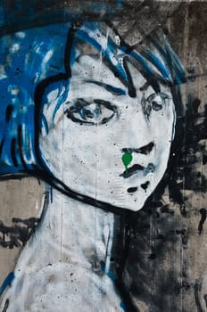 urban art street in paris - woman face