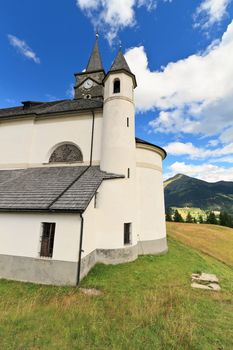 characteristic alpine church in Laste, Veneto Italy