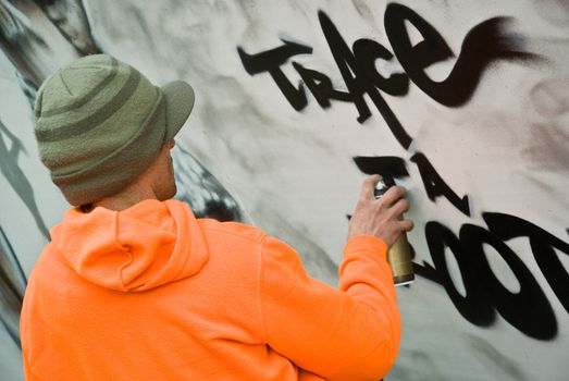 urban Art street in paris - man with paint bomb