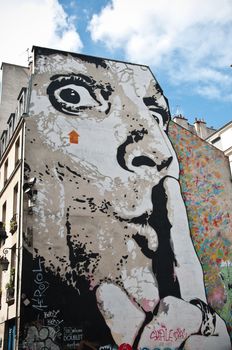 urban art  street in Paris- man face with finger