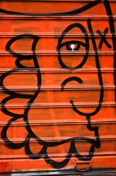 urban Art street in paris - abstract face