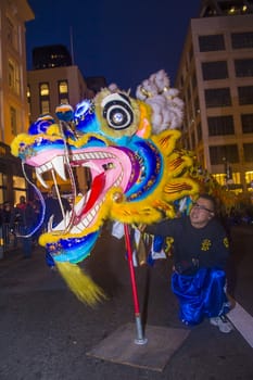 SAN FRANCISCO - FEB 15 : An unidentified participant in a Dragon dance at the Chinese New Year Parade in San Francisco , California on February 15 2014 , It is the largest Asian event in North America 