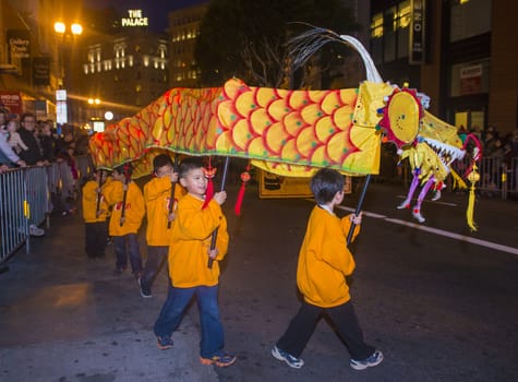 SAN FRANCISCO - FEB 15 : An unidentified participants in a Dragon dance at the Chinese New Year Parade in San Francisco , California on February 15 2014 , It is the largest Asian event in North America 