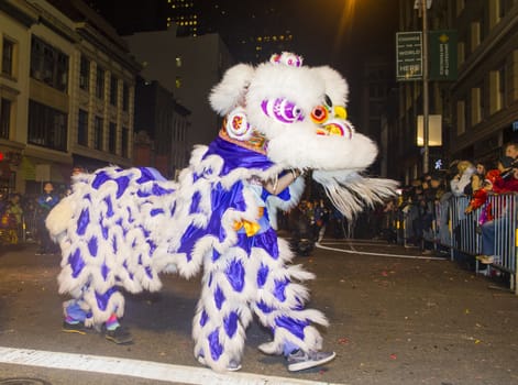 SAN FRANCISCO - FEB 15 : An unidentified participants in a Lion dance at the Chinese New Year Parade in San Francisco , California on February 15 2014 , It is the largest Asian event in North America 