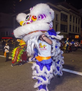 SAN FRANCISCO - FEB 15 : An unidentified participant in a Lion dance at the Chinese New Year Parade in San Francisco , California on February 15 2014 , It is the largest Asian event in North America 