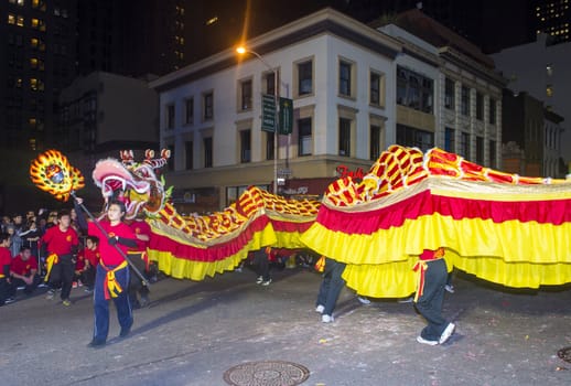 SAN FRANCISCO - FEB 15 : An unidentified participants in a Dragon dance at the Chinese New Year Parade in San Francisco , California on February 15 2014 , It is the largest Asian event in North America 