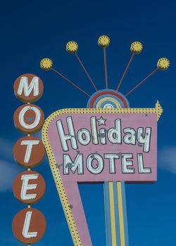 LAS VEGAS - OCT 08 : Iconic neon sign from the classic days of Las Vegas advertising the Holiday Motel in Las Vegas on October 08 , 2013 