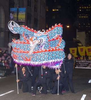 SAN FRANCISCO - FEB 15 : An unidentified participants in a Dragon dance at the Chinese New Year Parade in San Francisco , California on February 15 2014 , It is the largest Asian event in North America 