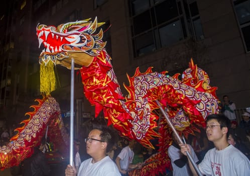 SAN FRANCISCO - FEB 15 : An unidentified participants in a Dragon dance at the Chinese New Year Parade in San Francisco , California on February 15 2014 , It is the largest Asian event in North America 