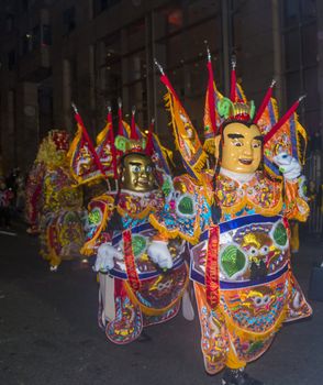 SAN FRANCISCO - FEB 15 : An unidentified participants with traditional man-size costumes at the annual Chinese new year parade on February 15 2014 on San Francisco , California