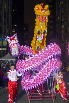 SAN FRANCISCO - FEB 15 : An unidentified participants in a Dragon dance at the Chinese New Year Parade in San Francisco , California on February 15 2014 , It is the largest Asian event in North America 