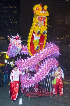 SAN FRANCISCO - FEB 15 : An unidentified participants in a Dragon dance at the Chinese New Year Parade in San Francisco , California on February 15 2014 , It is the largest Asian event in North America 