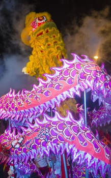 SAN FRANCISCO - FEB 15 : An unidentified participants in a Dragon dance at the Chinese New Year Parade in San Francisco , California on February 15 2014 , It is the largest Asian event in North America 