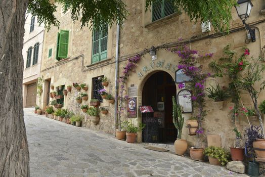 Typical Mediterranean Village with Flower Pots in Facades in Valldemossa, Mallorca, Spain ( Balearic Islands )
