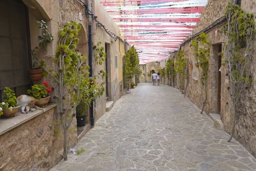 Typical Mediterranean Village with Flower Pots in Facades in Valldemossa, Mallorca, Spain ( Balearic Islands )