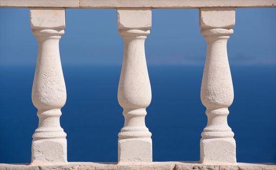 stone white balustrade with pillar on sky background