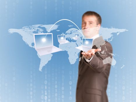 Businessman in a suit hold virtual world map with laptops. Internet concept