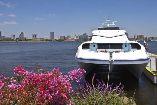 Moored ferry and the Long Beach skyline California.